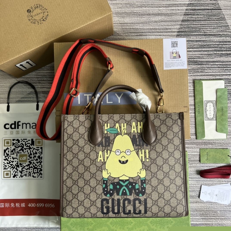 G*u*i shopping bags
